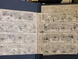 an old comic book opened to reveal a story