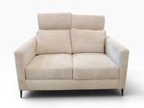 the two seater sofa is made of fabric and has two pillows