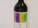 a bottle of wine that is sitting on a table