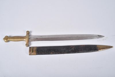 two knives that are laying next to each other on a table