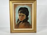 portrait of a woman in a black hat by a gold frame