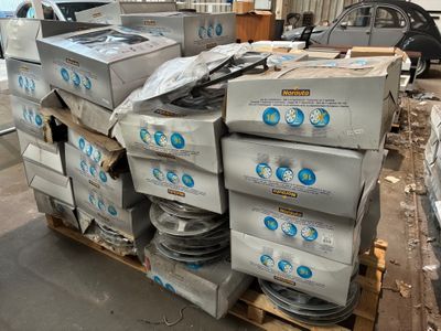 a pallet full of boxes of water sitting on a pallet