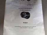 a piece of paper that is on top of a metal pan