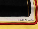 yellow t - shirt with black and red square print on the front