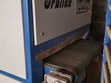 a machine that is sitting inside of a building