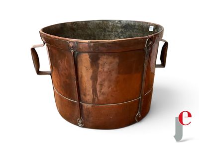a large metal bucket with handles on a white background