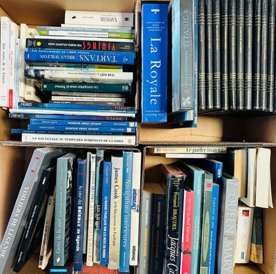 a box full of books that are stacked on top of each other