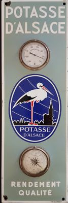 a picture of a sign with a clock and a picture of a stork