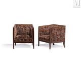 pair of leather armchairs in the manner of paul van deren