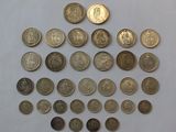 a lot of coins that are on the table