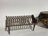 pair of antique cast iron garden bench and urn
