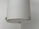 a white lamp that is hanging from the ceiling