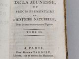 an open book with a black and white title on it