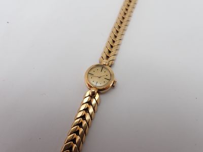 BREGUET montre de dame, boitier et bracelet or, poids 46,4gr, longueur - Photo 1