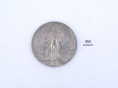 an image of a silver coin with a woman on it