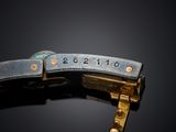 an image of a close up of a metal object with numbers on it