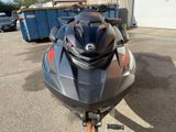 a picture of a jet ski parked in a parking lot