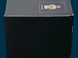 a black box that has a bottle of wine inside of it
