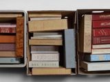 a box full of books sitting on a table
