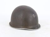 a close up of a helmet on a white surface