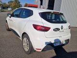 a white car that is parked in a parking lot