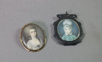two miniature portraits of a lady and a man