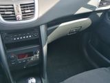a dashboard of a car with a steering control in it