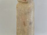 une image représentant une figurine en pierre représentant un homme