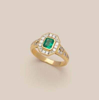 an emerald and diamond ring