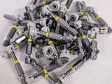 a pile of legos sitting on a white surface