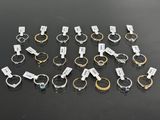 a lot of different types of rings on a table