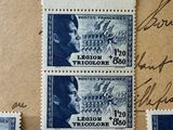 four stamps with a picture of a man and a woman on them
