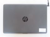 a laptop that is sitting on a white surface