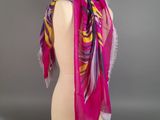 a pink scarf on a mannequin head on a mannequin mannequin