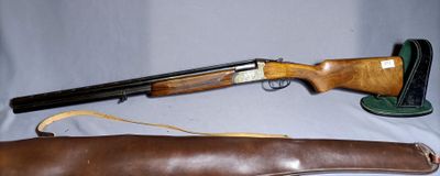 two shotguns and a leather case on a white background