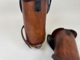 a pair of boots that are next to each other on a table
