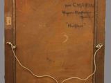 an old wooden picture frame with writing on it and a picture of a dog
