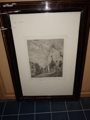une photo d'une photo représentant une maison, dans un cadre