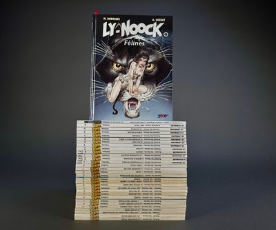 books stacked on top of each other on a table