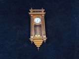 a clock hanging on the wall of a room