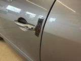 a close up of a door handle on a car
