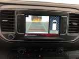 a picture of a car ' s rear view camera in the dash