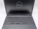 the dell laptop is open and ready to be used