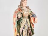 an image of a statue of a woman holding a pot