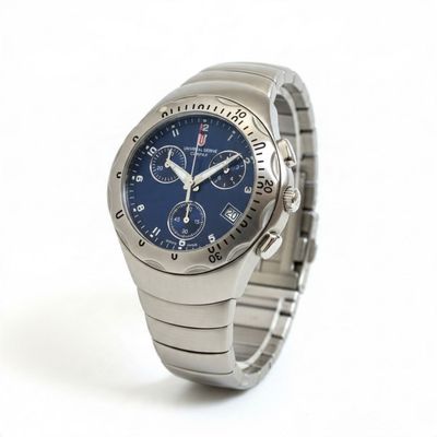 a silver watch with a blue face on a white background