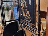 a room with a lot of antique furniture on display