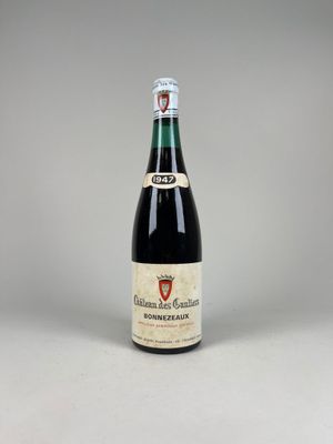 a bottle of wine sitting on top of a table