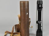 two different types of flashlights and a case on a white background