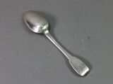 a spoon that is sitting on a table