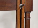 a close up of a wooden pole with a door handle